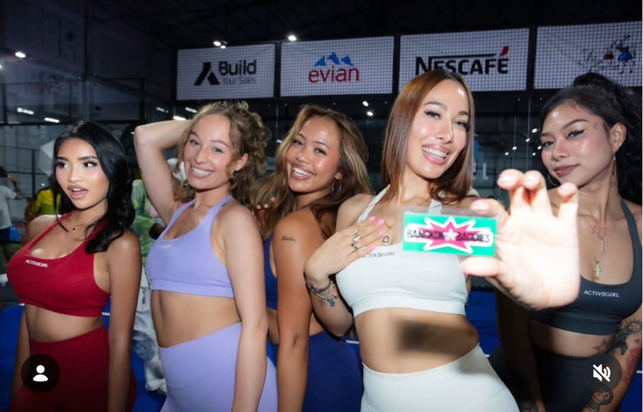 Five women in Activegirl sets holding a Bangkok Baddies card